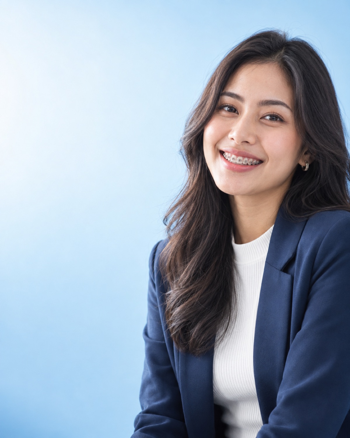 Malaysian adult wearing conventional braces